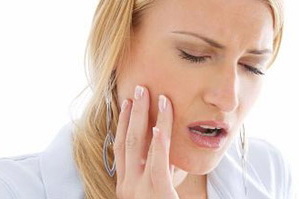 причины боли в челюсти