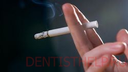 курение - одна из причин неприятного запаха изо рта